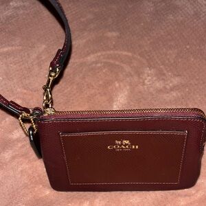 Coach Maroon Pebbled Leather Wristlet with Gold Logo